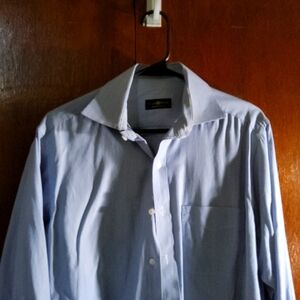 im selling a blue and white stripped button down shirt